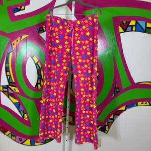 Body Candy, Colorful Star Print Fuzzy Pants. Size Medium. Good used condition!